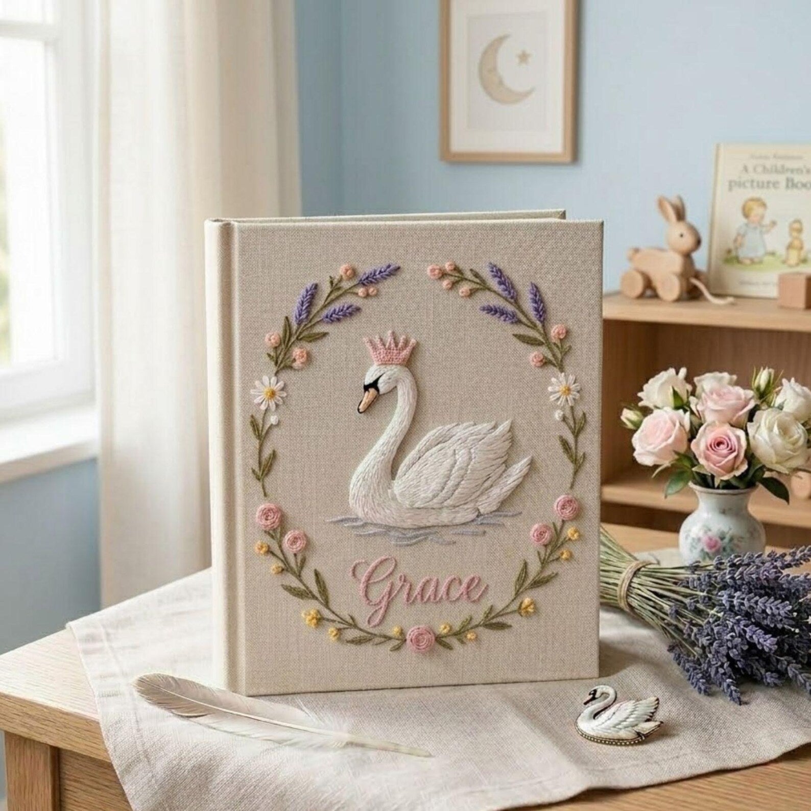 Personalized swan princess hand embroidered baby photo album with floral wreath nursery design on linen cover