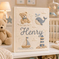 Personalized hand embroidered baby photo album with whale, lighthouse, sailboat, and teddy bear nautical embroidery