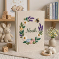 Personalized floral bee hand embroidered baby photo album with lavender daisy wreath design on linen cover