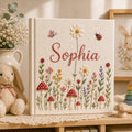 Personalized hand embroidered baby photo album with wildflowers mushrooms butterflies and ladybugs
