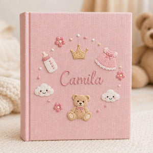 Personalized princess teddy hand embroidered baby photo album with pink nursery and crown design on linen cover
