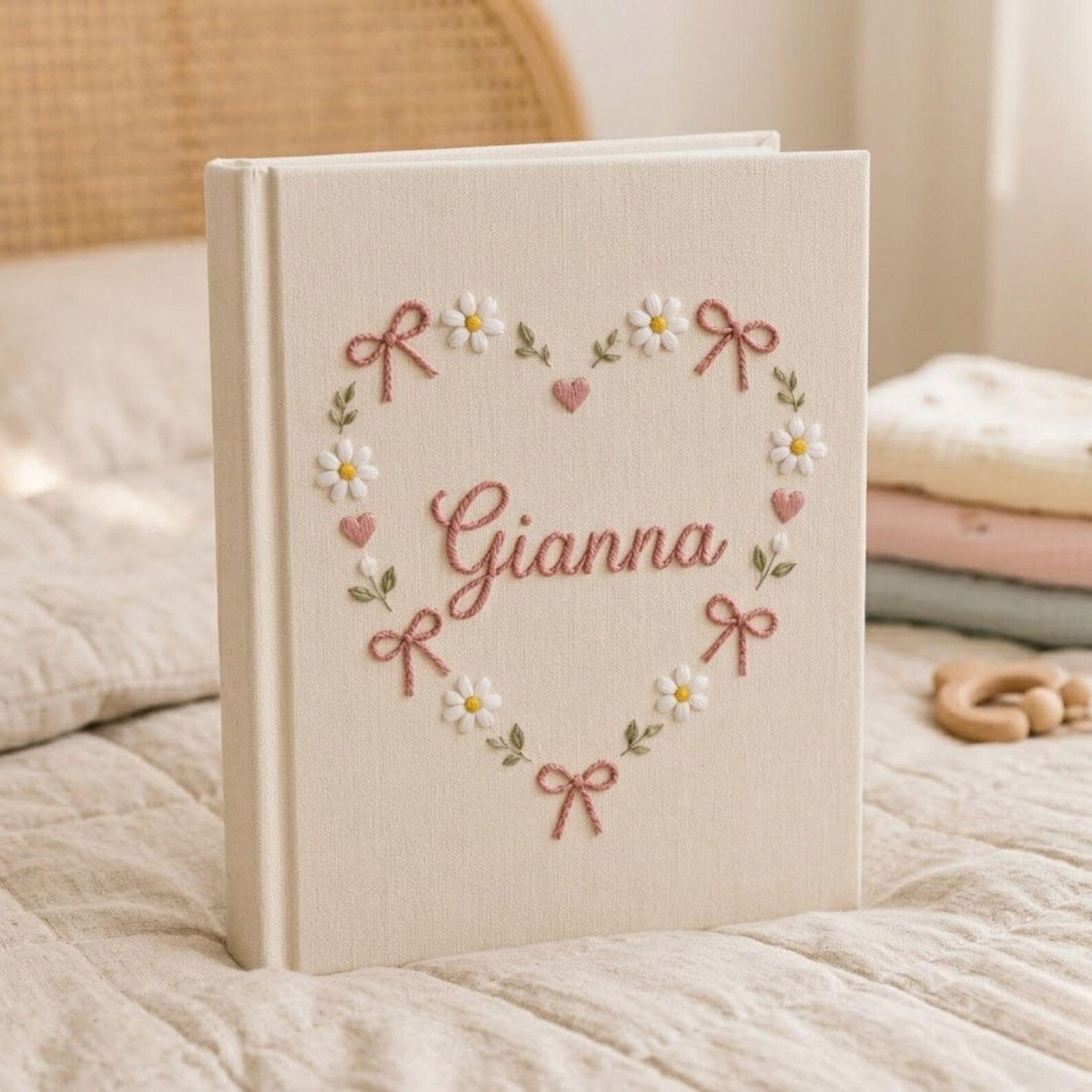 Personalized daisy heart hand embroidered photo album with floral bow and pastel design on linen cover