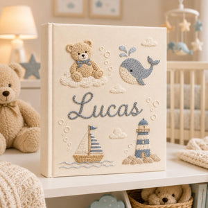 Personalized hand embroidered baby photo album with whale, lighthouse, sailboat, and teddy bear nautical embroidery
