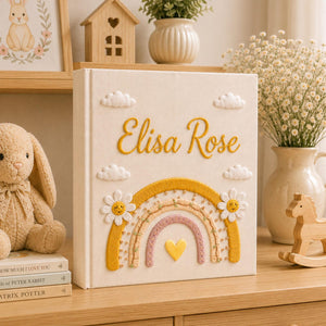 Personalized rainbow hand embroidered photo album with daisy flowers and pastel nursery keepsake design