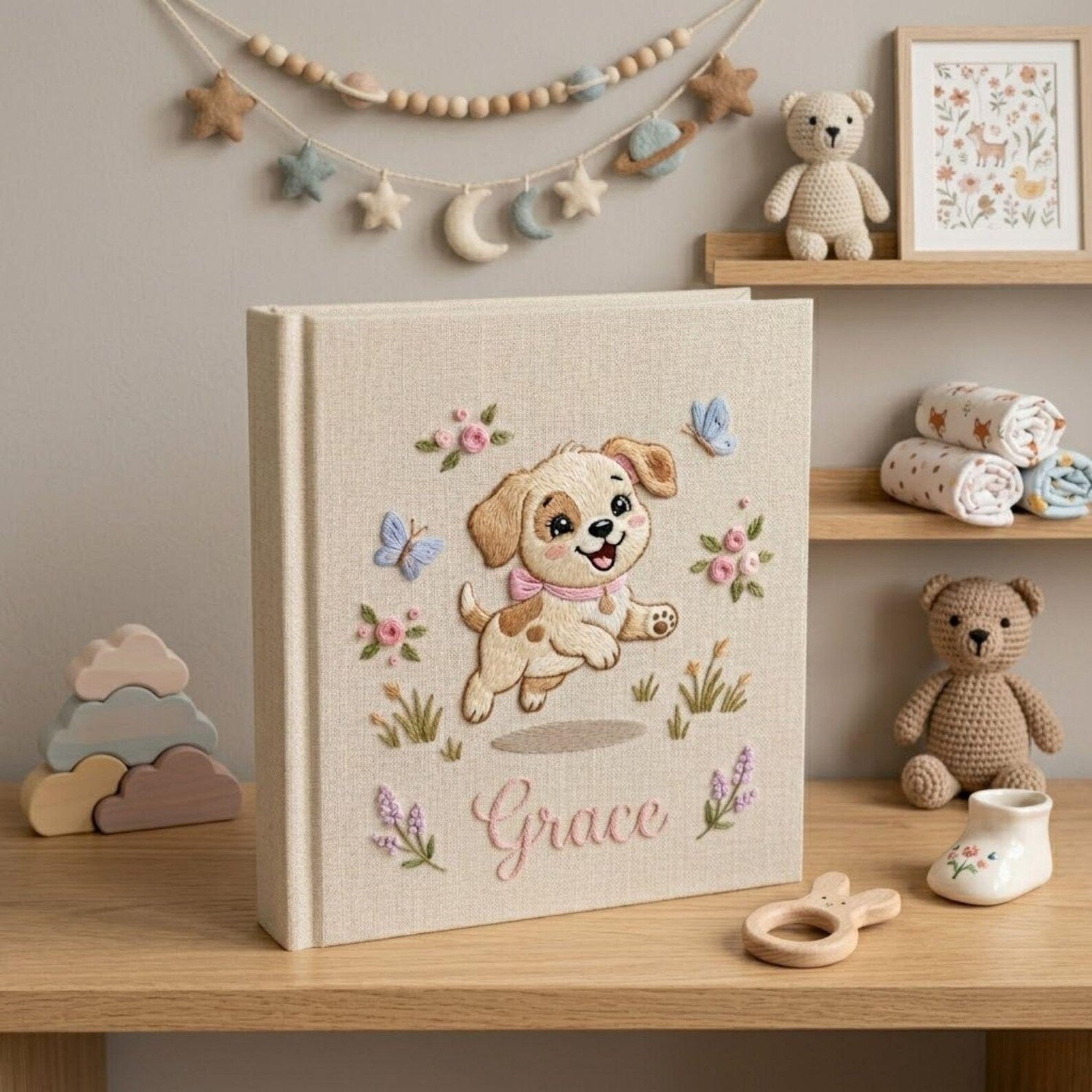 Personalized embroidered baby photo album with cute puppy, butterflies, pastel flowers, and custom name embroidery