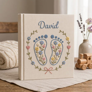 Personalized baby feet hand embroidered photo album with floral pastel footprint design on linen cover