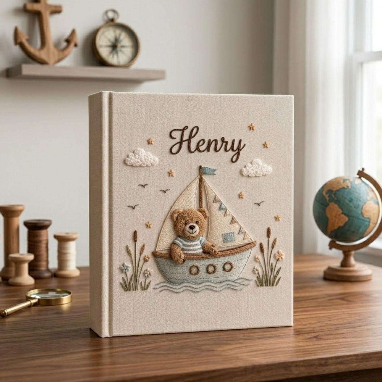 Personalized teddy sailboat hand embroidered baby photo album with nautical coastal nursery design on linen cover