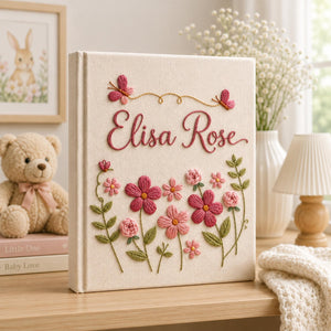 Personalized hand embroidered floral baby photo album with pink flowers and butterfly accents