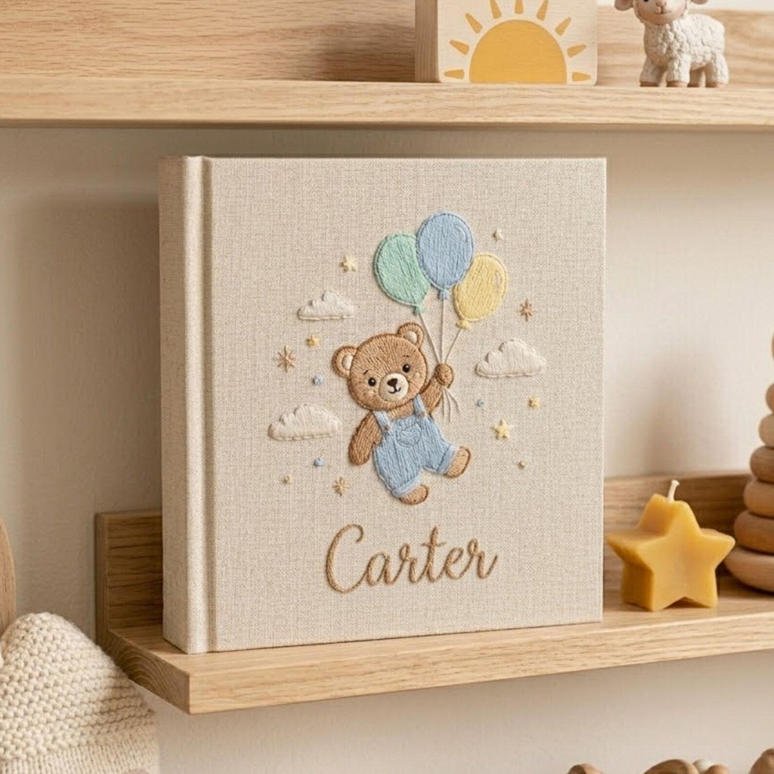 Personalized teddy balloon hand embroidered baby photo album with pastel nursery design on linen cover
