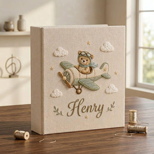 Personalized teddy aviator airplane hand embroidered baby photo album with vintage airplane nursery design on linen cover