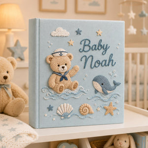 Personalized hand embroidered baby photo album with sailor teddy bear, whale, seashells, and nautical ocean embroidery