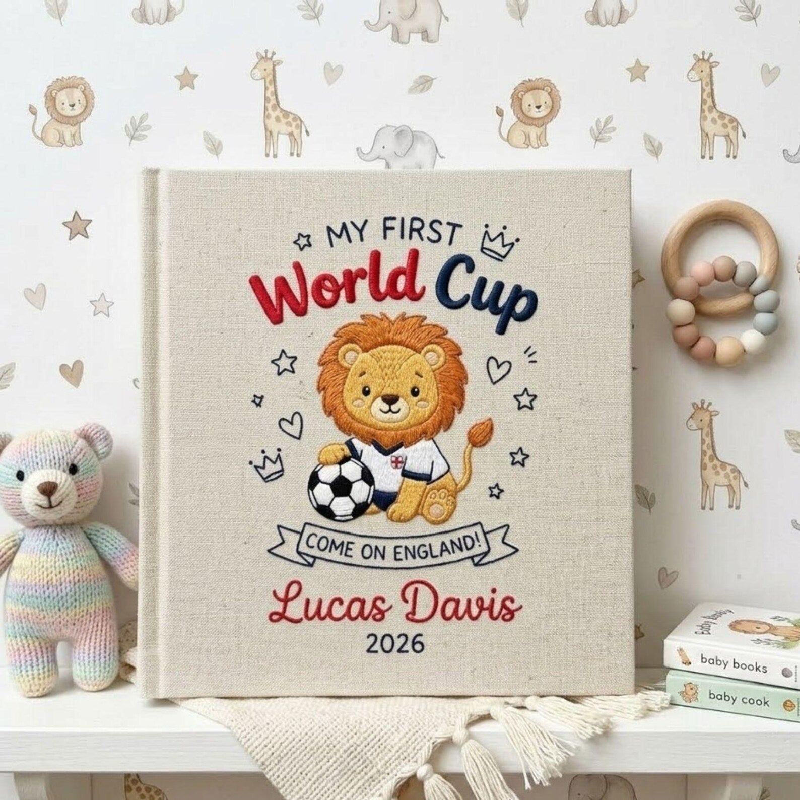 Personalized hand embroidered photo album featuring a cute soccer lion with football and First World Cup theme customized with baby name