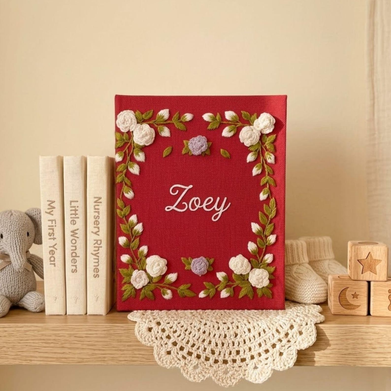 Personalized floral frame hand embroidered baby photo album with embroidered roses and greenery on berry red linen cover