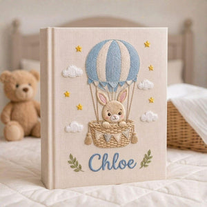 Personalized bunny balloon hand embroidered baby photo album with hot air balloon cloud and star design on linen cover