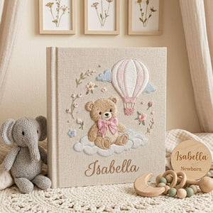 Personalized teddy hot air balloon embroidered baby photo album with pastel nursery design on linen cover