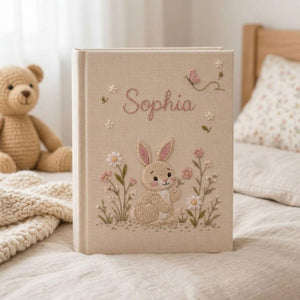 Personalized floral bunny hand embroidered baby photo album with pastel flowers and butterfly design on linen cover