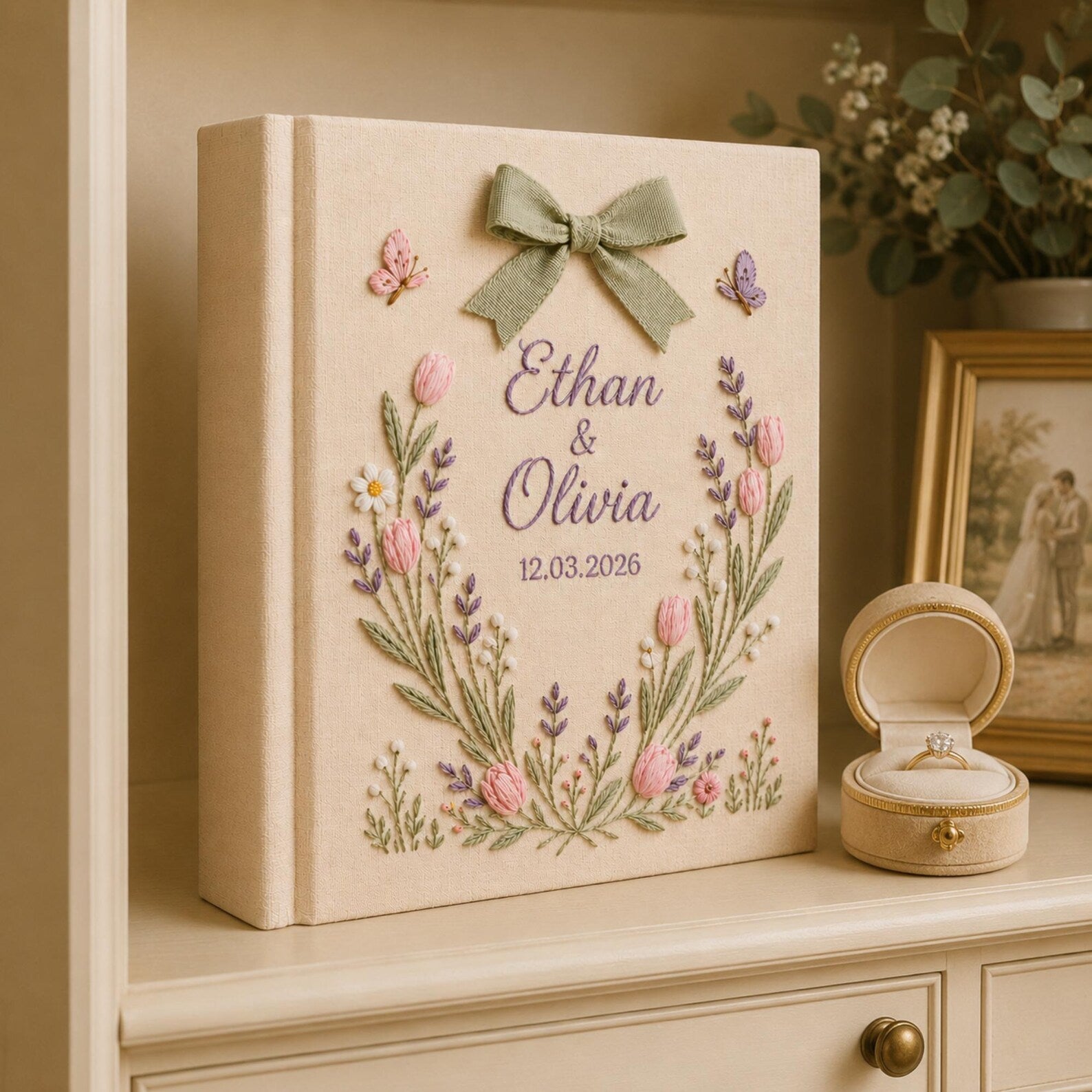 Personalized hand embroidered tulip floral wedding photo album with bow detail and custom couple names on linen cover