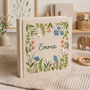 Personalized wildflower garden hand embroidered baby photo album with botanical floral meadow design on linen cover