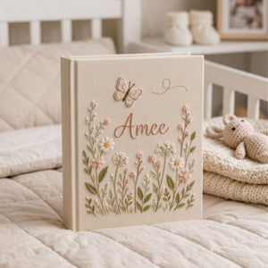 Personalized wildflower butterfly hand embroidered baby photo album with floral botanical design on linen cover