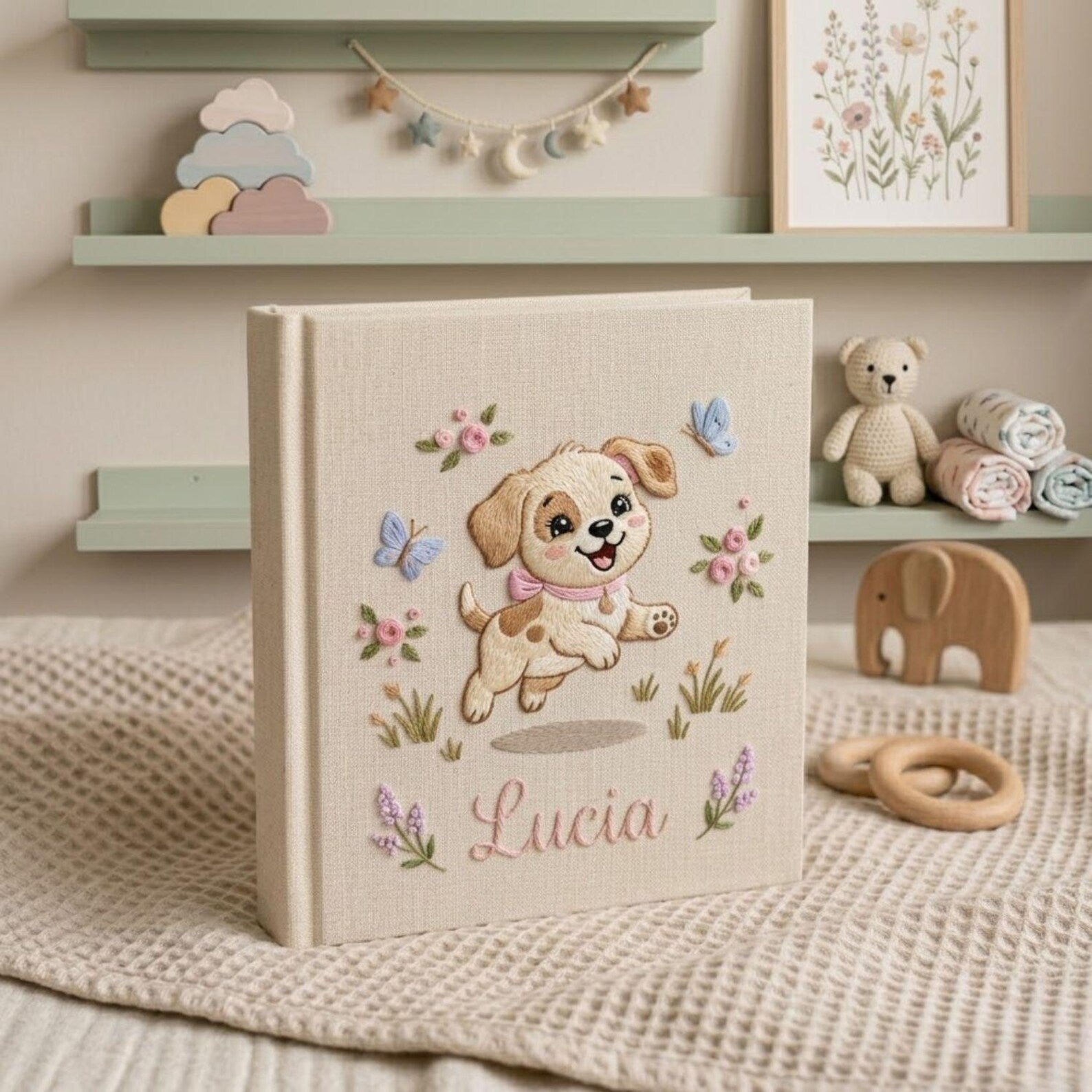 Personalized embroidered baby photo album with cute puppy, butterflies, pastel flowers, and custom name embroidery