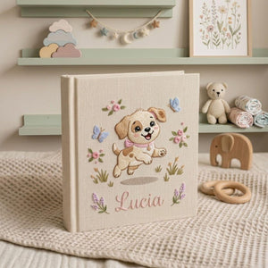 Personalized embroidered baby photo album with cute puppy, butterflies, pastel flowers, and custom name embroidery
