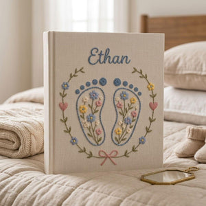 Personalized baby feet hand embroidered photo album with floral pastel footprint design on linen cover