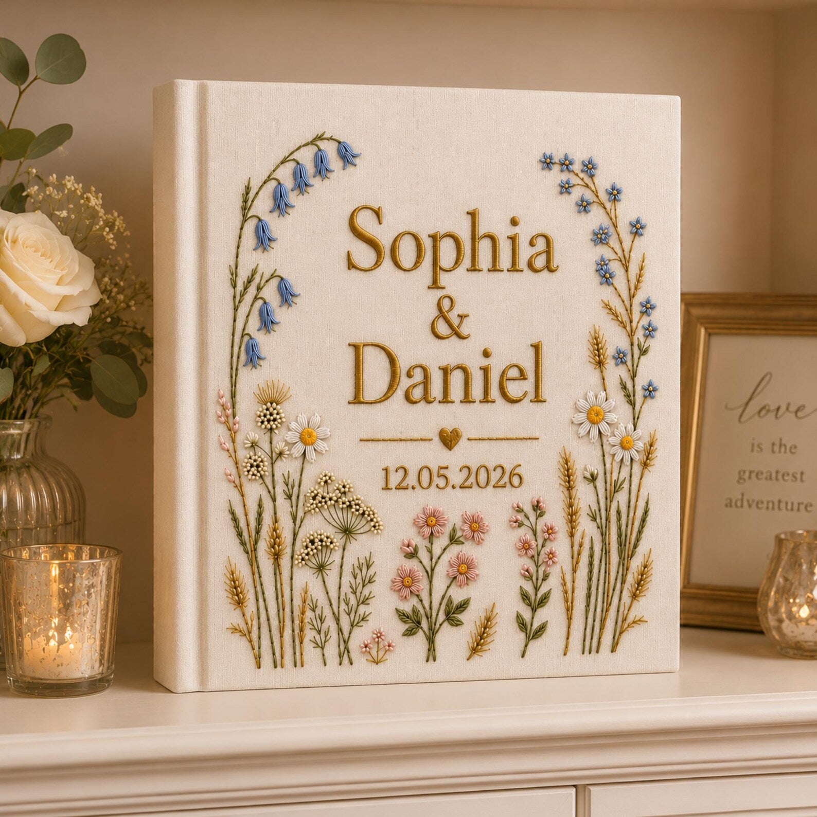 Personalized hand embroidered wildflower wedding photo album with botanical floral design and custom names on linen cover