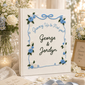 Personalized wedding photo album with blue floral embroidery ribbon border custom couple names and linen fabric cover