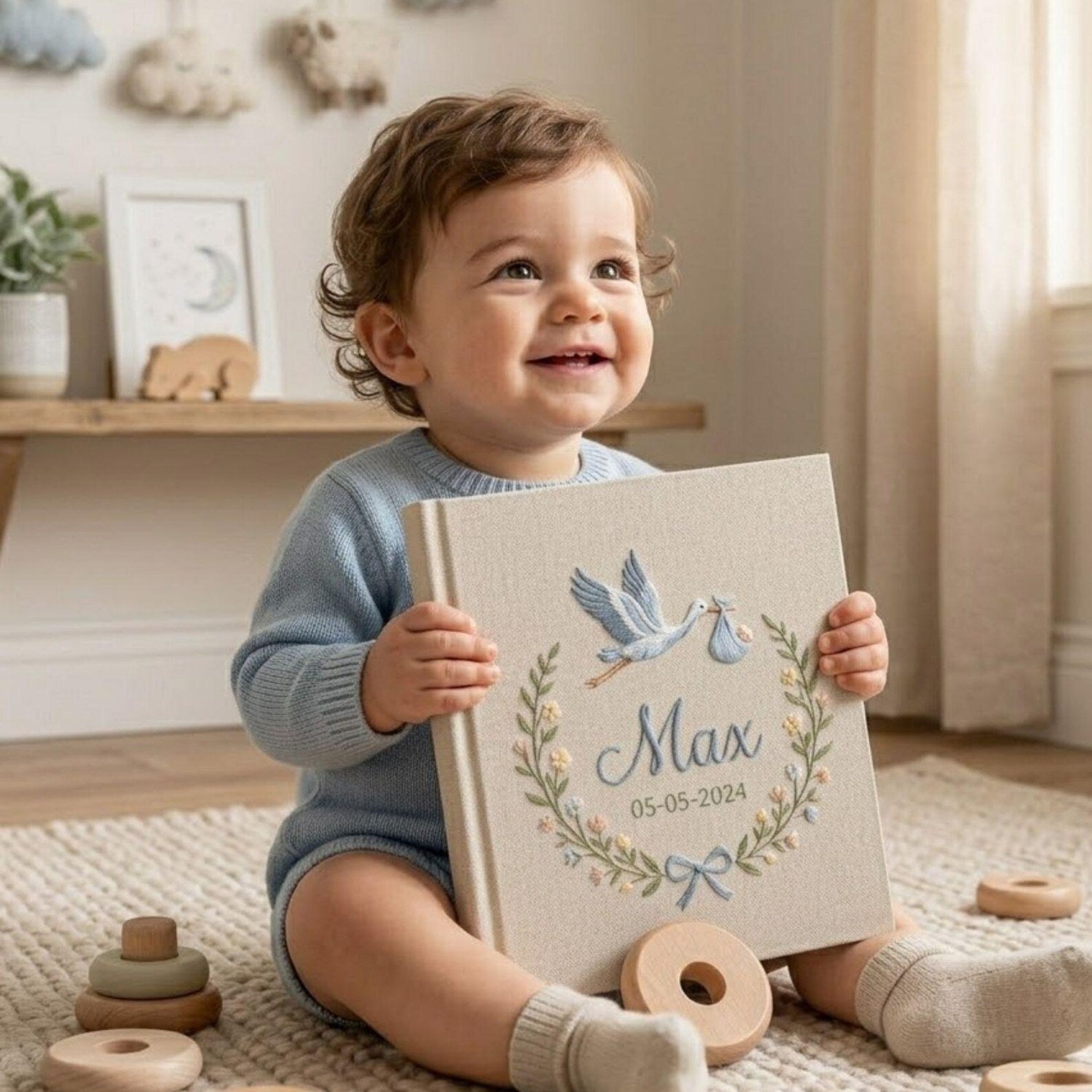 Personalized stork birth announcement embroidered baby photo album with custom name and birth date on linen cover