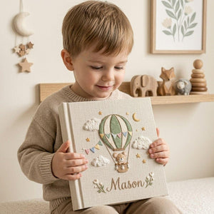 Personalized mouse hot air balloon embroidered baby photo album with whimsical nursery design on linen cover