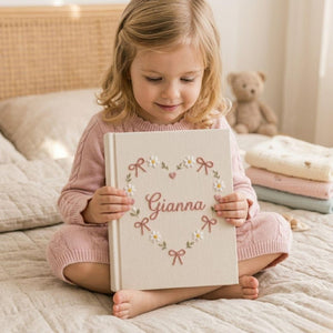 Personalized daisy heart hand embroidered photo album with floral bow and pastel design on linen cover