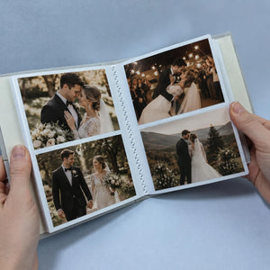 Personalized embroidered wedding photo album with pastel wildflowers, lavender floral embroidery, custom couple names, wedding date, and elegant linen hardcover design