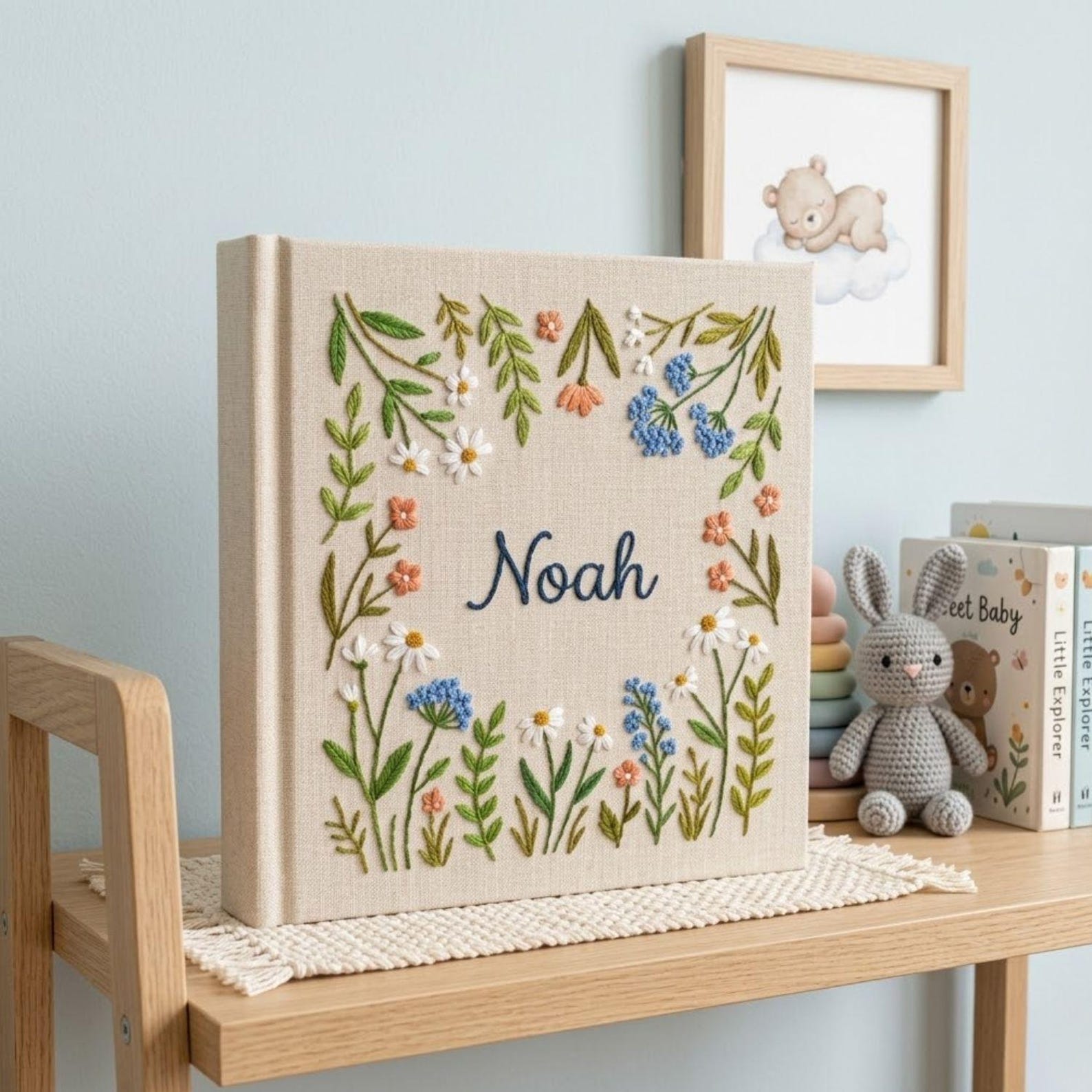 Personalized wildflower garden hand embroidered baby photo album with botanical floral meadow design on linen cover