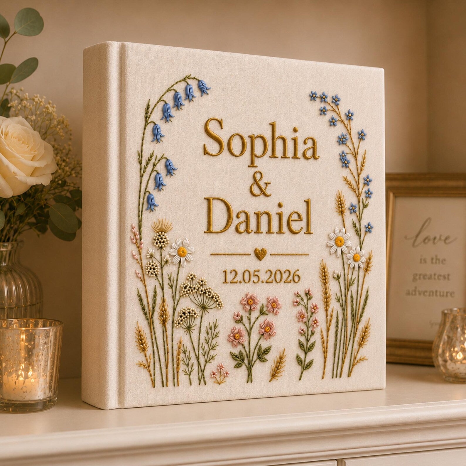 Personalized hand embroidered wildflower wedding photo album with botanical floral design and custom names on linen cover
