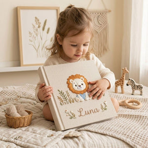 Personalized baby lion hand embroidered photo album with safari botanical design on linen cover