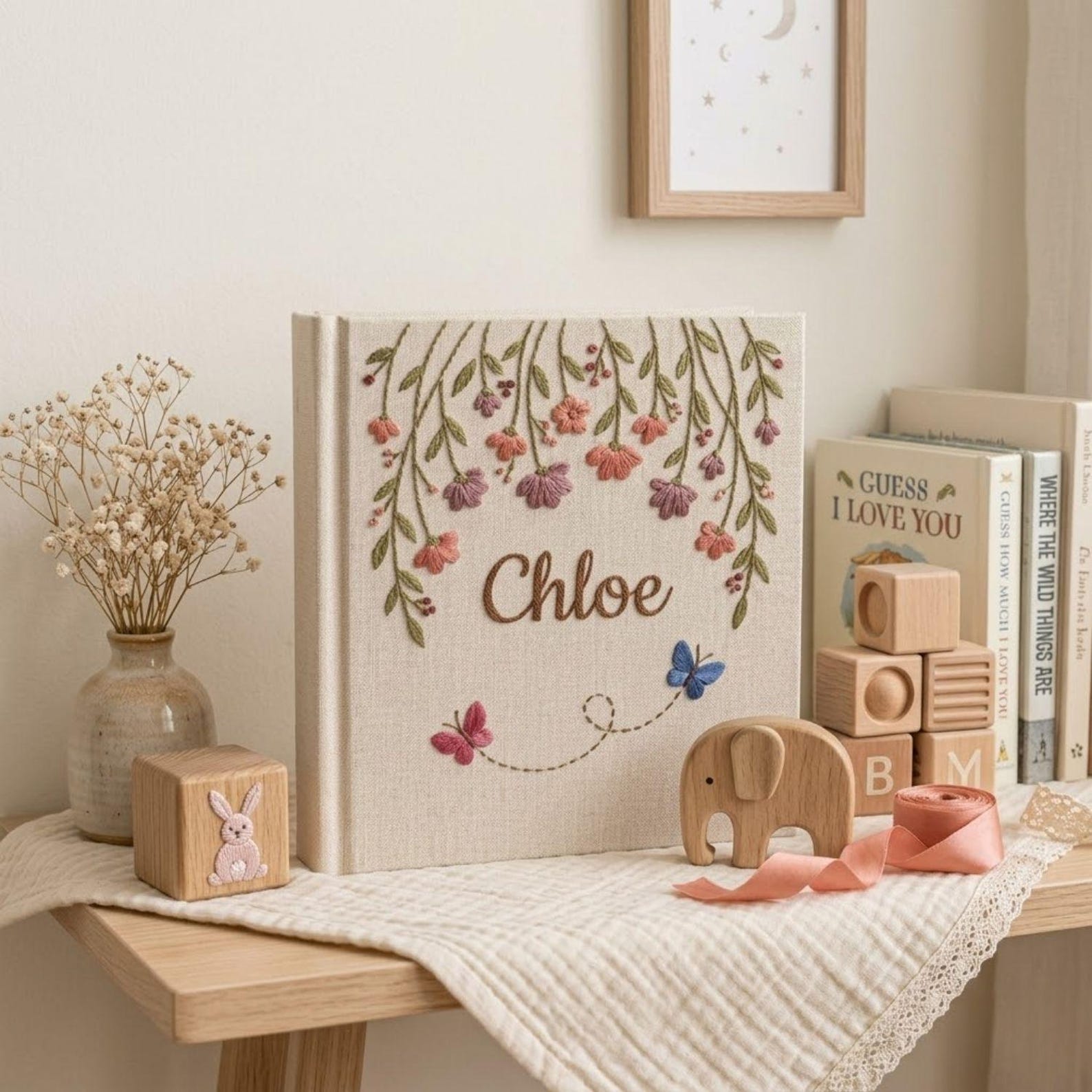 Personalized hanging floral butterfly hand embroidered baby photo album with botanical flower design on linen cover