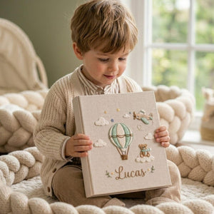 Personalized adventure travel hand embroidered baby photo album with hot air balloon airplane and teddy bear design on linen cover