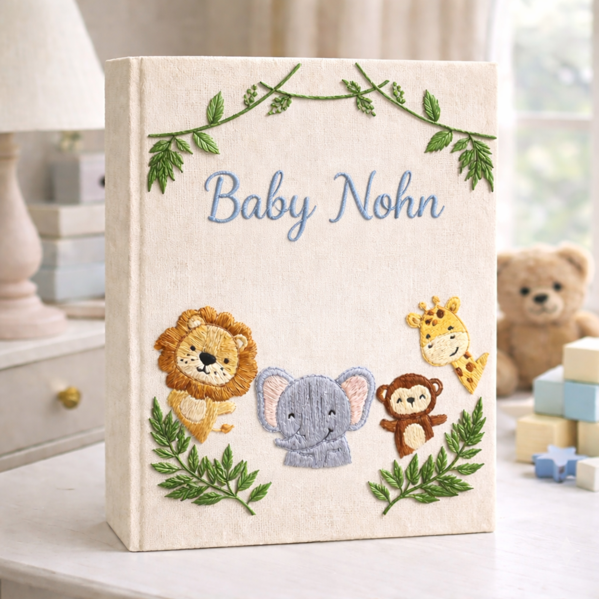 Personalized hand embroidered photo album featuring safari animals and custom birth statistics including weight, length, and birth time