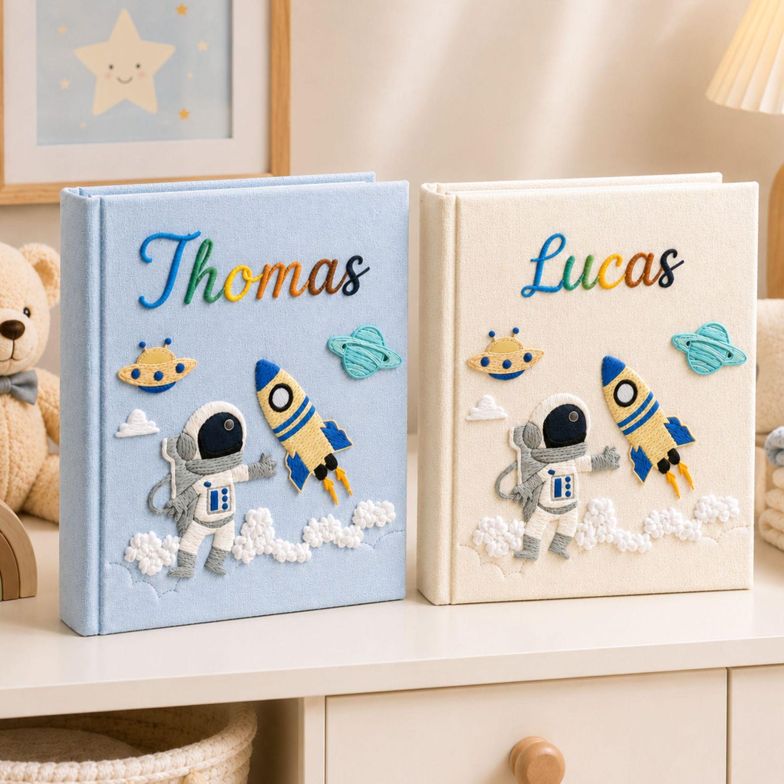 Personalized hand embroidered photo album featuring astronaut rocket ship planets and custom baby name on linen cover