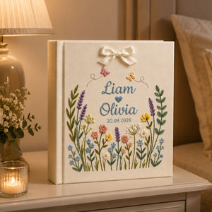Personalized wildflower meadow hand embroidered photo album with custom names date butterflies and ribbon bow on linen cover