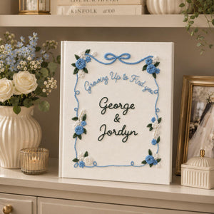 Personalized wedding photo album with blue floral embroidery ribbon border custom couple names and linen fabric cover