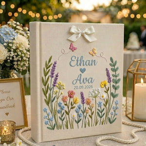 Personalized wildflower meadow hand embroidered photo album with custom names date butterflies and ribbon bow on linen cover