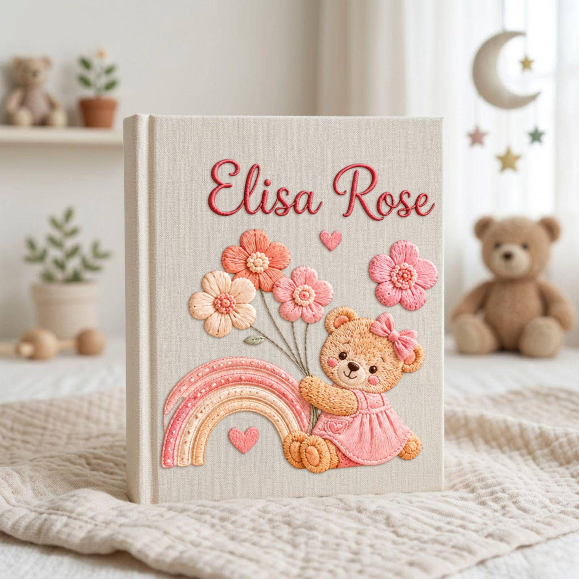 Personalized hand embroidered baby photo album with teddy bear, pastel rainbow, and pink floral embroidery